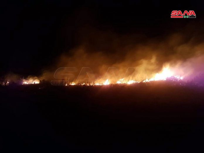 إخماد حريق اندلع في أحراج بلدة اللقبة بمنطقة مصياف بريف حماة