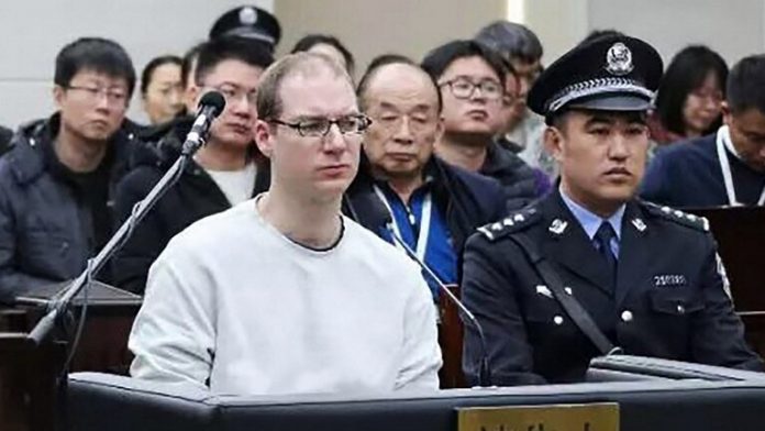 محكمة صينية تصدر حكما بالسجن 11 عاما على كندي بتهمة التجسس